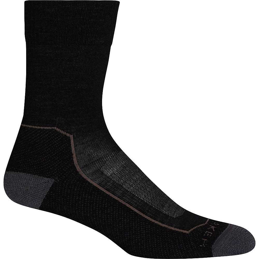 The Icebreaker Womens Hike+ Light Crew Sock is a single black crew sock with dark gray heel and toe accents, shown side view on a white background—ideal cozy hiking socks for any adventure.