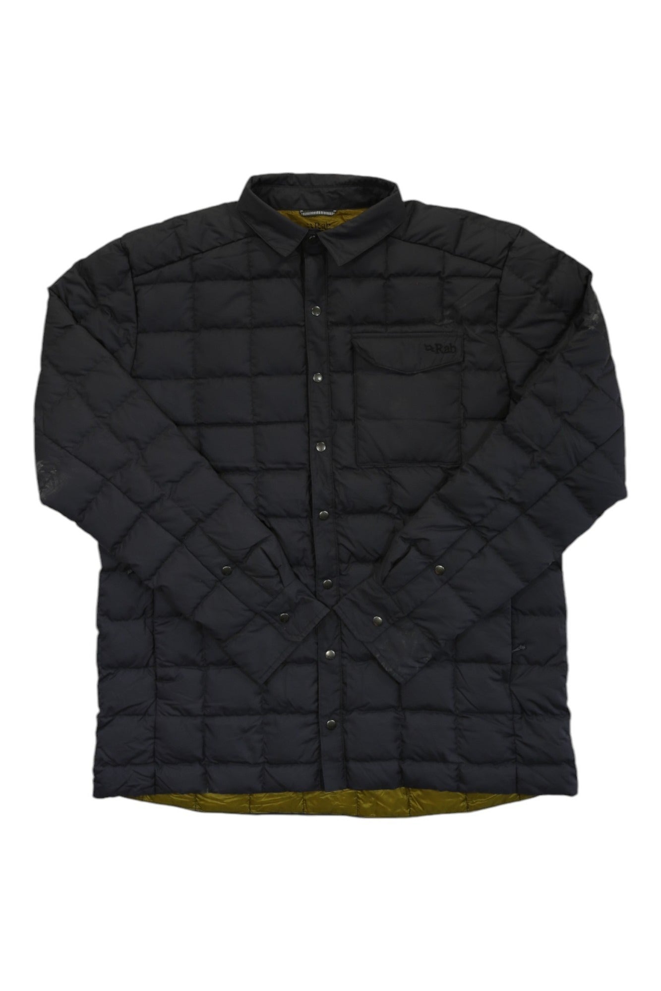 The Rab Mens Downtime Shirt Jacket is a black, long-sleeve insulated shirt with snap buttons, collar, and chest pocket—perfect for versatile outdoor wear. Shown laid flat on a white background.