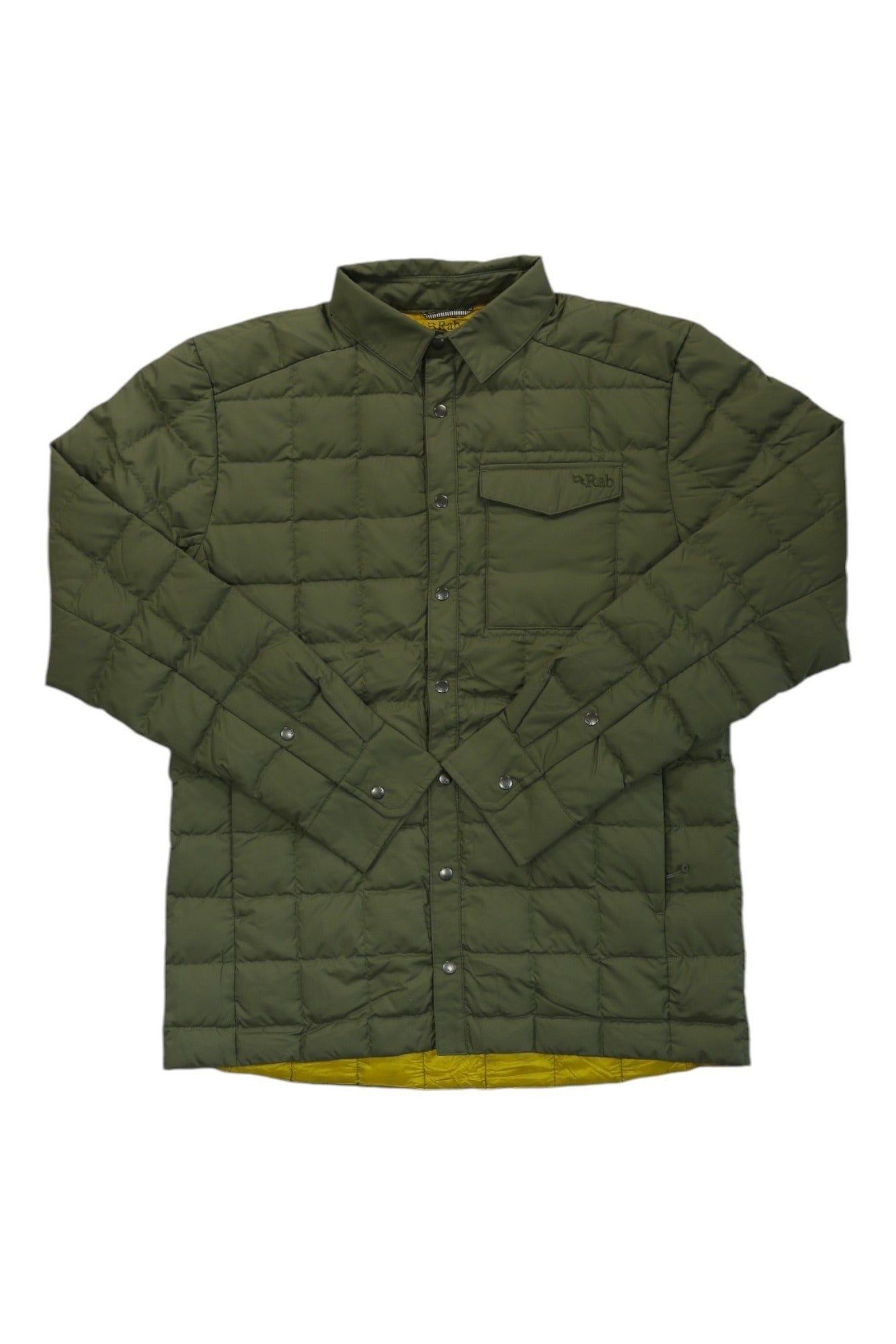 The Rab Mens Downtime Shirt Jacket is a green quilted insulated shirt jacket with a collar, chest pocket, long sleeves, and a yellow inner lining, laid flat on a white background for versatility in outdoor wear.