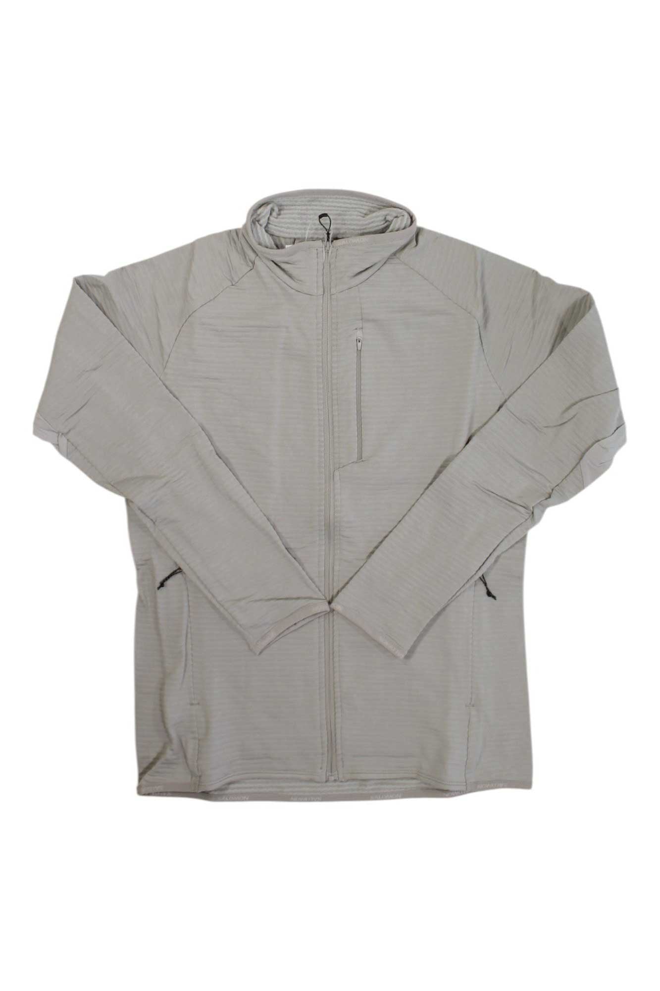 A Salomon Womens Essential LT Warm Full Zip Jacket in light gray, with long sleeves, high collar, and zippered chest pocket, is shown flat on a white background.