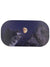 A bright full moon illuminates snow-capped peaks as it reflects off a GoggleSoc Protective Goggle Cover lying on the snowy ground.