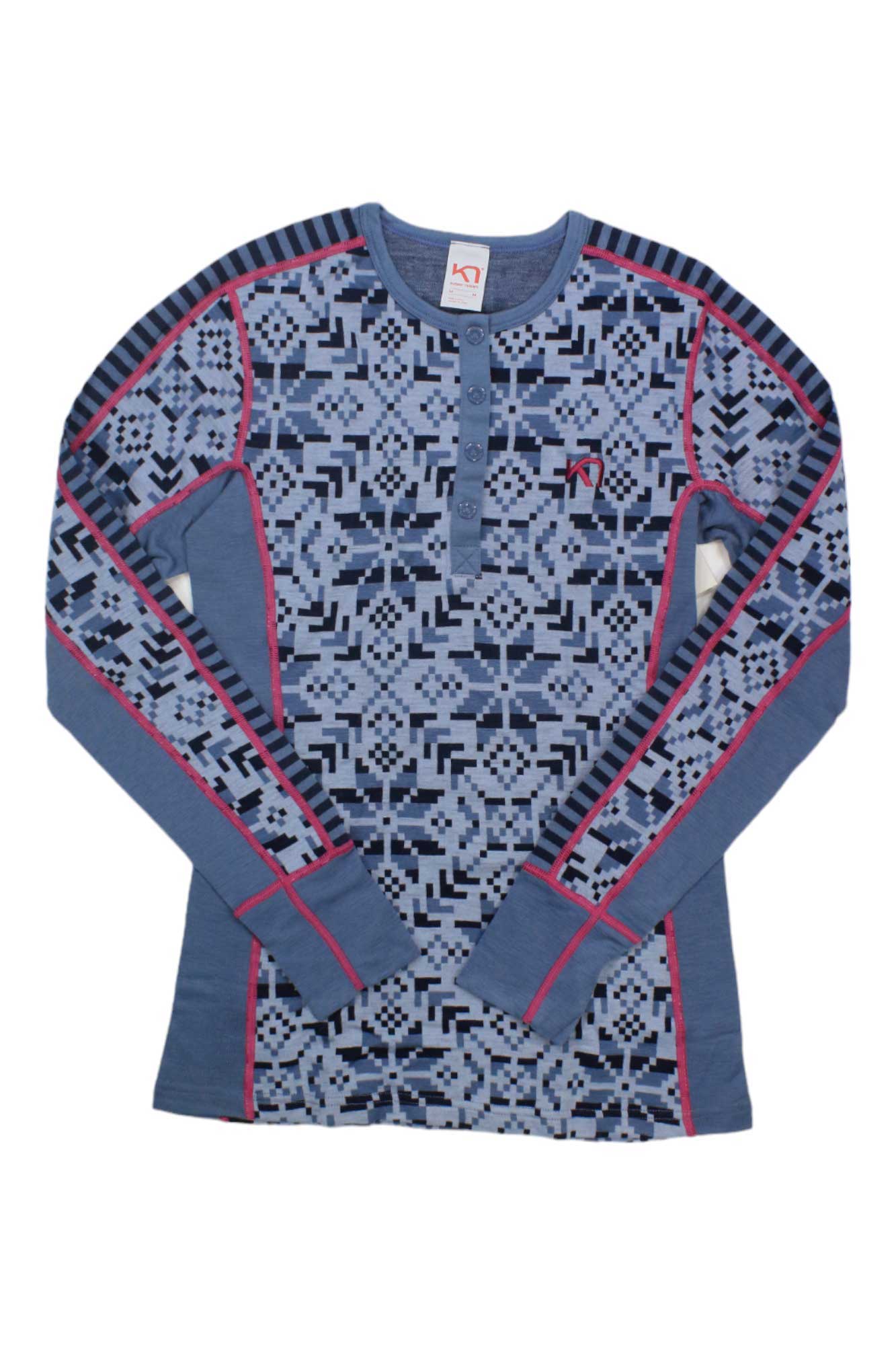The Kari Traa Womens Else LS Top is a blue, long-sleeve merino wool baselayer with geometric patterns, black and pink seam edging, and a partial button placket—perfect as a stylish women's outdoor top.
