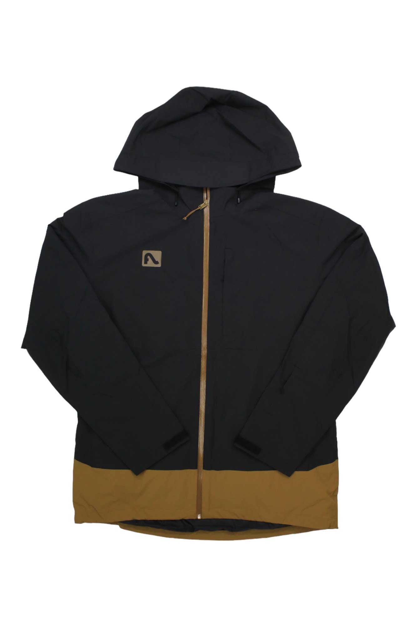 The Flylow Men's Dante Jacket is a black technical hardshell with a brown zipper and hem band, a small logo on the left chest, and a waterproof breathable membrane for reliable protection.