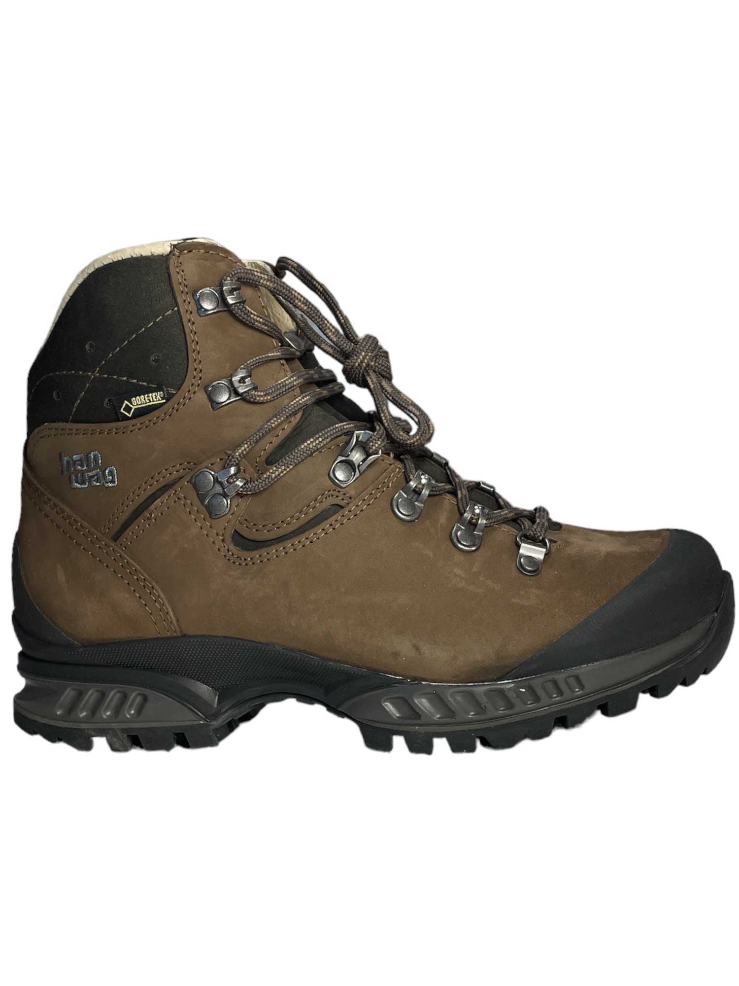 The Hanwag Womens Tatra II GTX Boot is a brown hiking boot with black accents, sturdy laces, metal eyelets, a thick textured sole for outdoor terrain, Gore-Tex protection, and 1896 branding on the side.