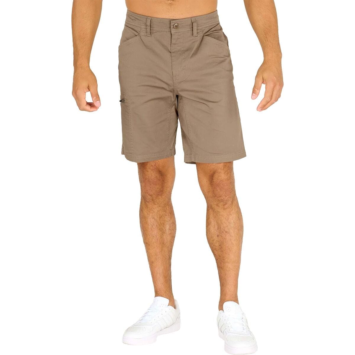 A person wears Sherpa Adventure Gear Men's Tenjing Shorts in Maato Grey with white sneakers, standing against a plain white background. Their arms are relaxed by their sides, and their upper body is not visible.
