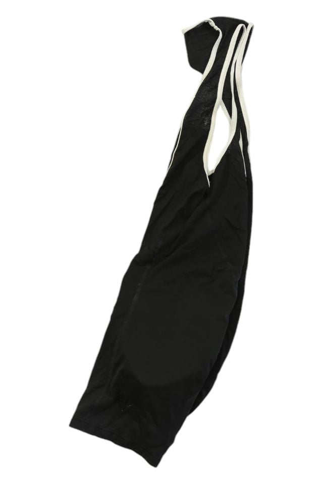 A side view of the Mens Bib Shorts against a white background shows their lightweight fabric, making them an ideal layering piece for fans of men's cycling apparel.