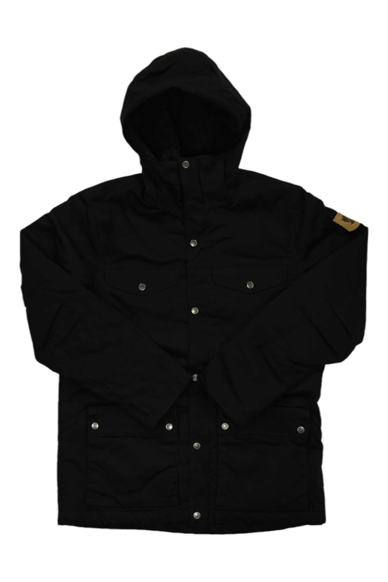 The Greenland Winter Insulated Jacket is a black men's outdoor jacket with a hood, front snap buttons, four pockets, and a tan patch on the upper left sleeve. Made from durable G-1000 Eco fabric, shown flat on a white background.