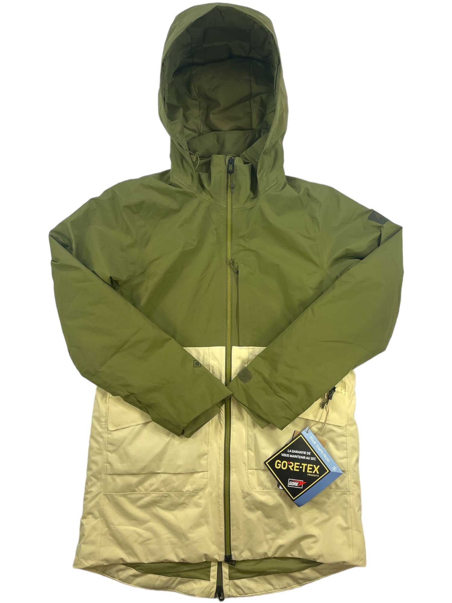 The Burton Womens GTX Treeline Jacket is a two-tone Gore-Tex jacket with an olive green top, hood, and beige lower section. This waterproof, breathable jacket with a front zipper is shown laid flat on a white background.