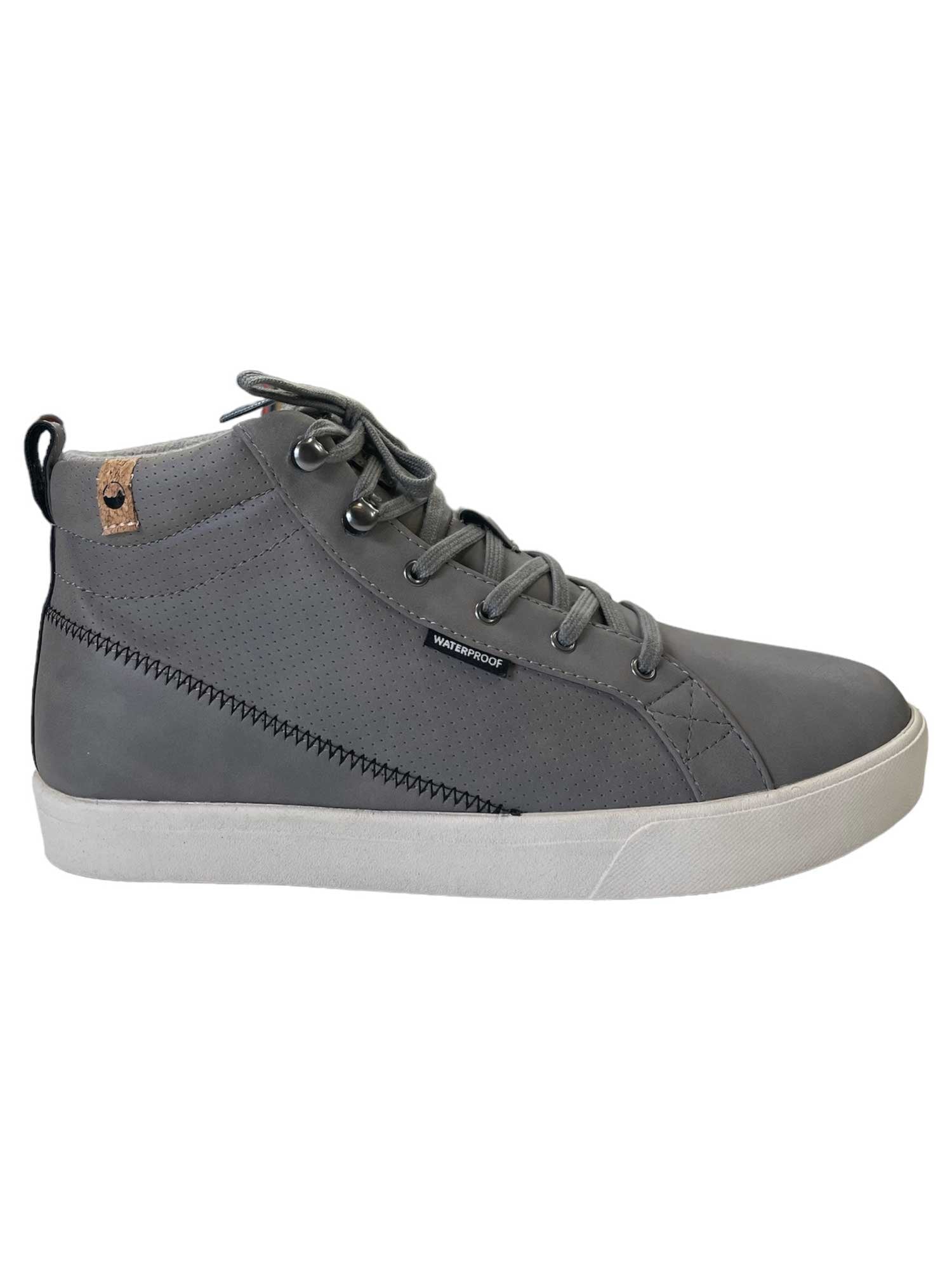 The Saola Women's Wanaka Waterproof Shoe is a gray high-top with a white sole, gray laces, a small brown accent near the ankle, visible stitching, and a "WATERPROOF" tag. It's made with recycled materials.