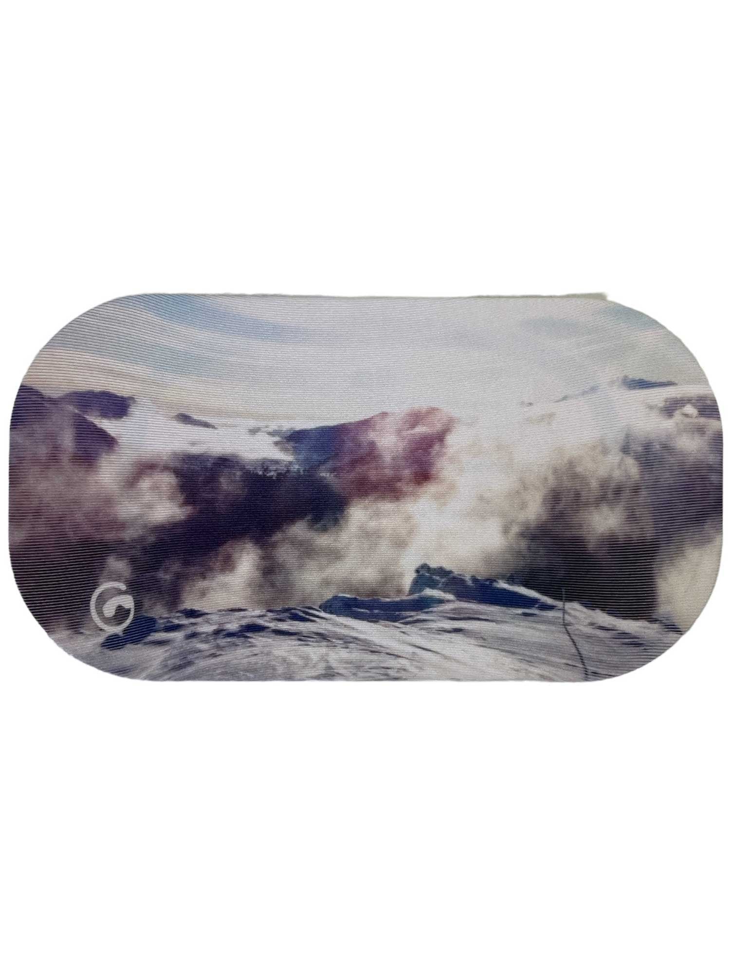 A scenic view of snow-capped mountains beneath a cloudy sky, partially veiled by mist, appears in an oval frame—making this design ideal for the GoggleSoc Protective Goggle Cover, which offers stylish, eco-friendly protection for your goggles.