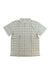 The Marmot Mens Eldridge Novelty Classic SS Shirt is a lightweight, short sleeve woven shirt in light gray and white plaid, featuring a collar and pocketless front, shown laid flat on a white background.