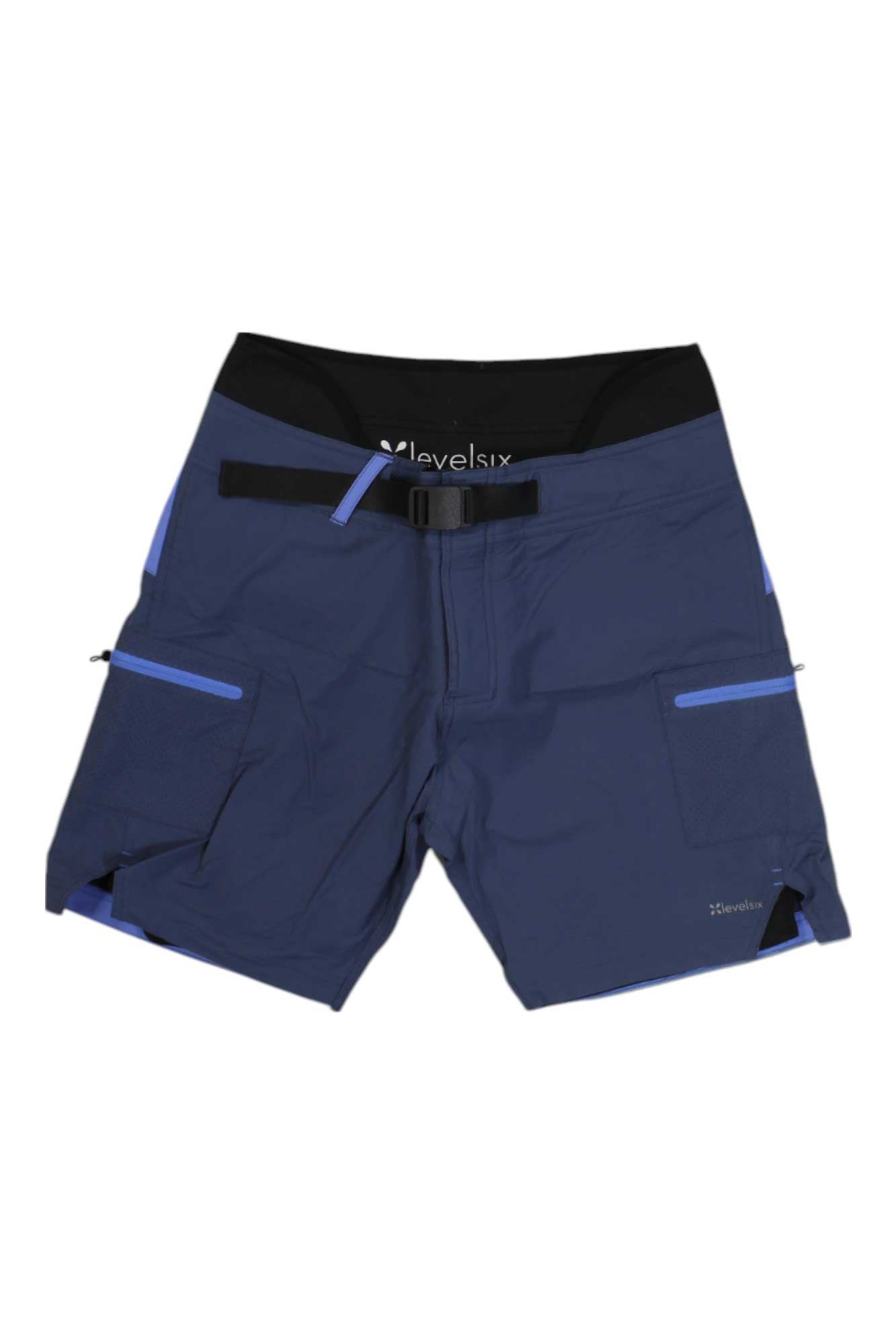 Level Six Women's Pro Goddess 7 Inch Short: Navy blue stretch nylon shorts with a black waistband, front zipper, belt buckle, and multiple side pockets—perfect high-rise shorts for active days. Brand logo visible inside the waistband.