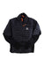 The Orage Men's Morrison Gilltek Hybrid Jacket is black and quilted with PrimaLoft Thermoplume insulation, a front zipper, orange collar drawstring, small triangular logo, and smooth stretchy recycled polyester sleeves and side panels.
