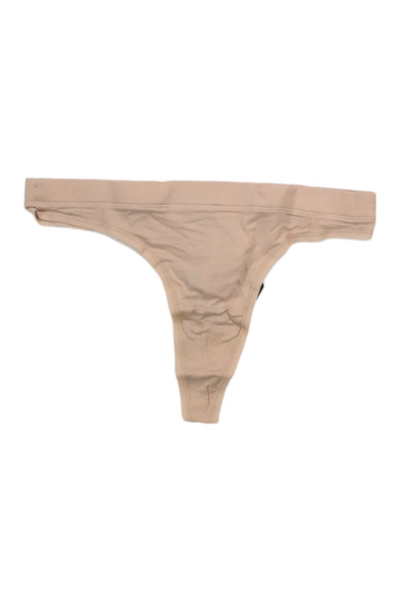 The ExOfficio Womens Everyday Thong in beige features seamless, moisture-wicking fabric and is displayed flat on a white background.