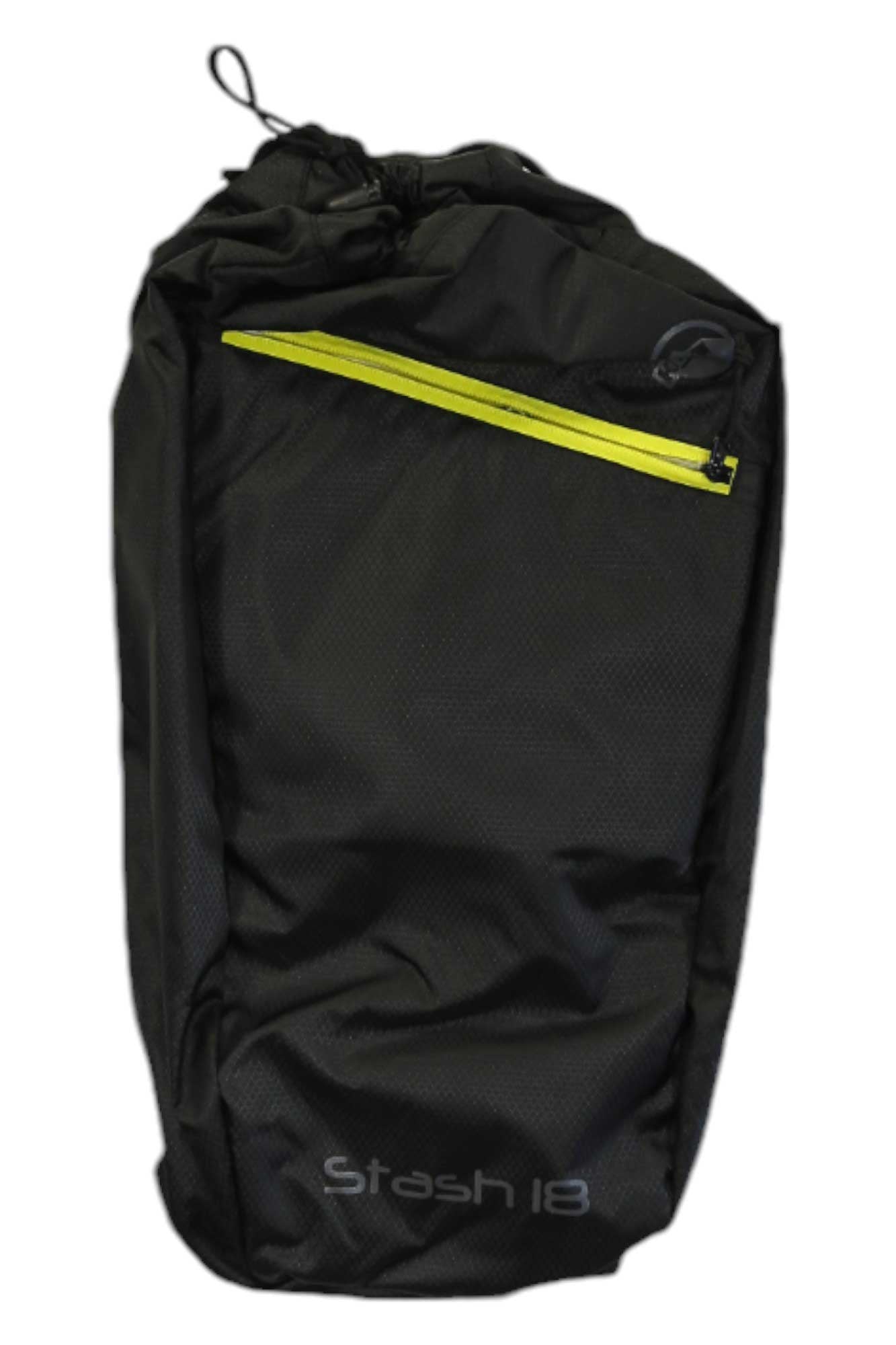 The Klymit Stash 18 Day Pack is a black day hiking backpack with a bright yellow diagonal front zipper pocket and a top drawstring closure. Its durable, textured material makes it ideal for lightweight packing on your adventures.