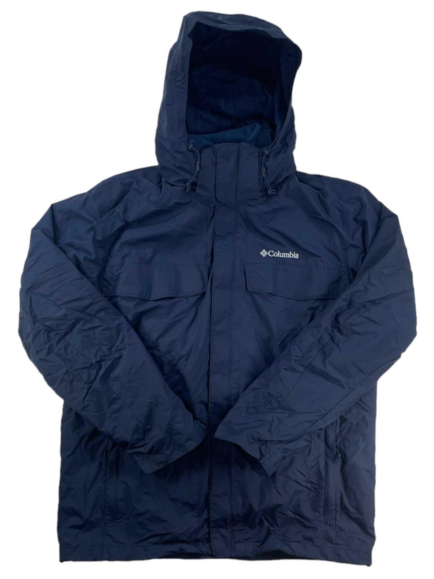 The Columbia Men's Bugaboo II Fleece Interchange Jacket is a navy blue 3-in-1 waterproof jacket with two chest pockets and the Columbia logo on the left chest, shown flat on a white background.