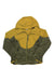 The Kari Traa Womens Sanne Wind Jacket is a two-toned windbreaker with mustard yellow on top and olive green below, made from recycled polyester. It features a front zipper and long sleeves, ideal for hiking.
