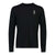 The Mons Royale Mens Cascade LS Top is a plain black, long-sleeve Merino wool t-shirt with a small white logo and text on the left chest and a tag at the hem—perfect for snowsports enthusiasts who value comfort and style.