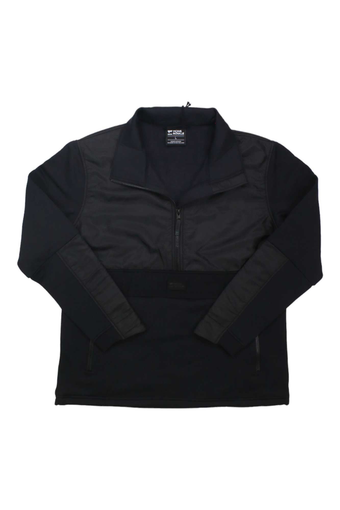 The Mons Royale Womens Decade Mid Pullover in black features a high collar, zip front, and two zippered pockets. Its water-resistant fabric blends smooth and textured materials—perfect for mountaineering adventures.