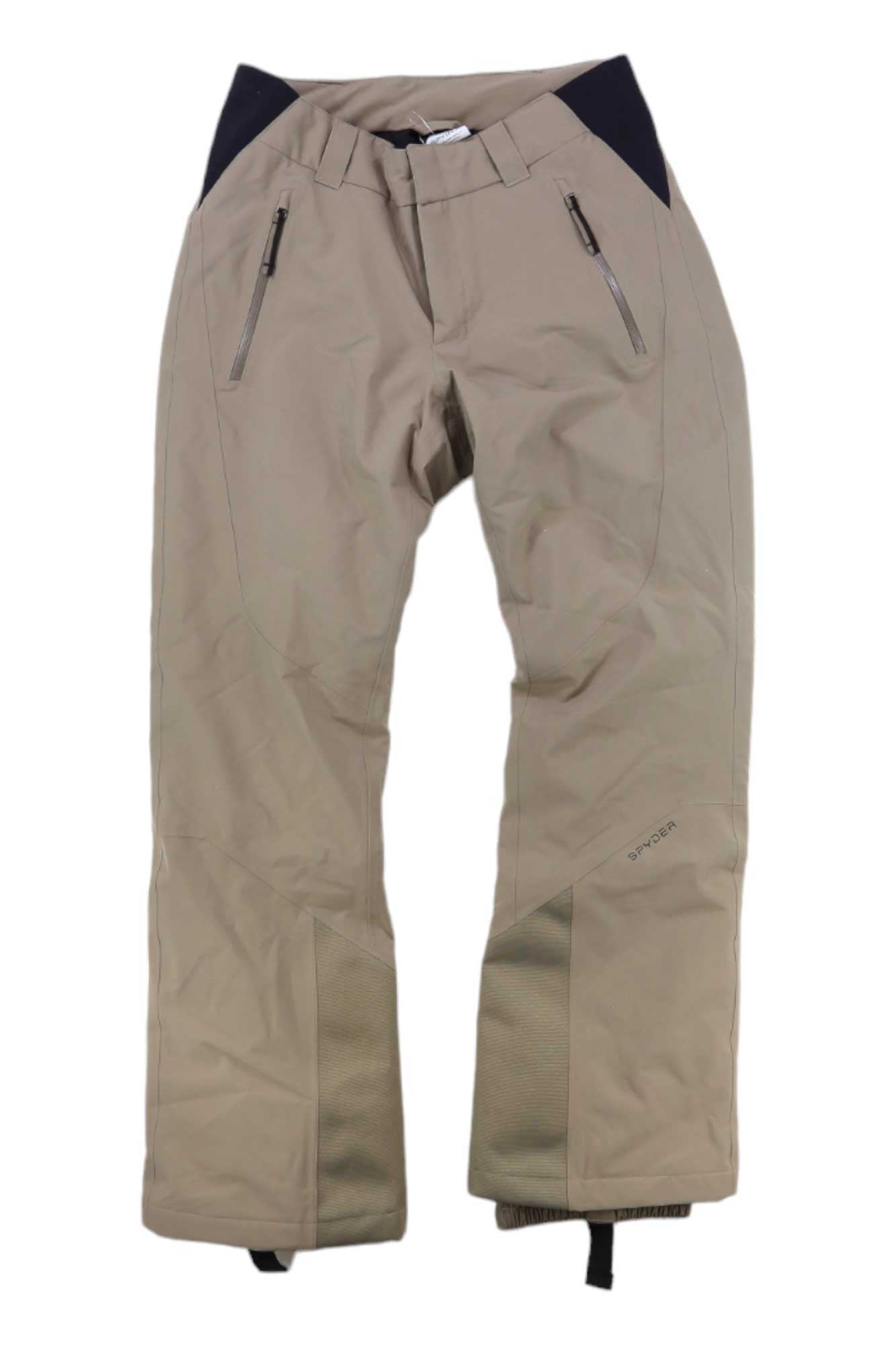 Spyder Womens Winner Pant in beige with black side panels, zippered pockets, reinforced knees and ankles, PrimaLoft insulation, waterproof fabric, and adjustable Velcro ankle straps shown flat on a white background.