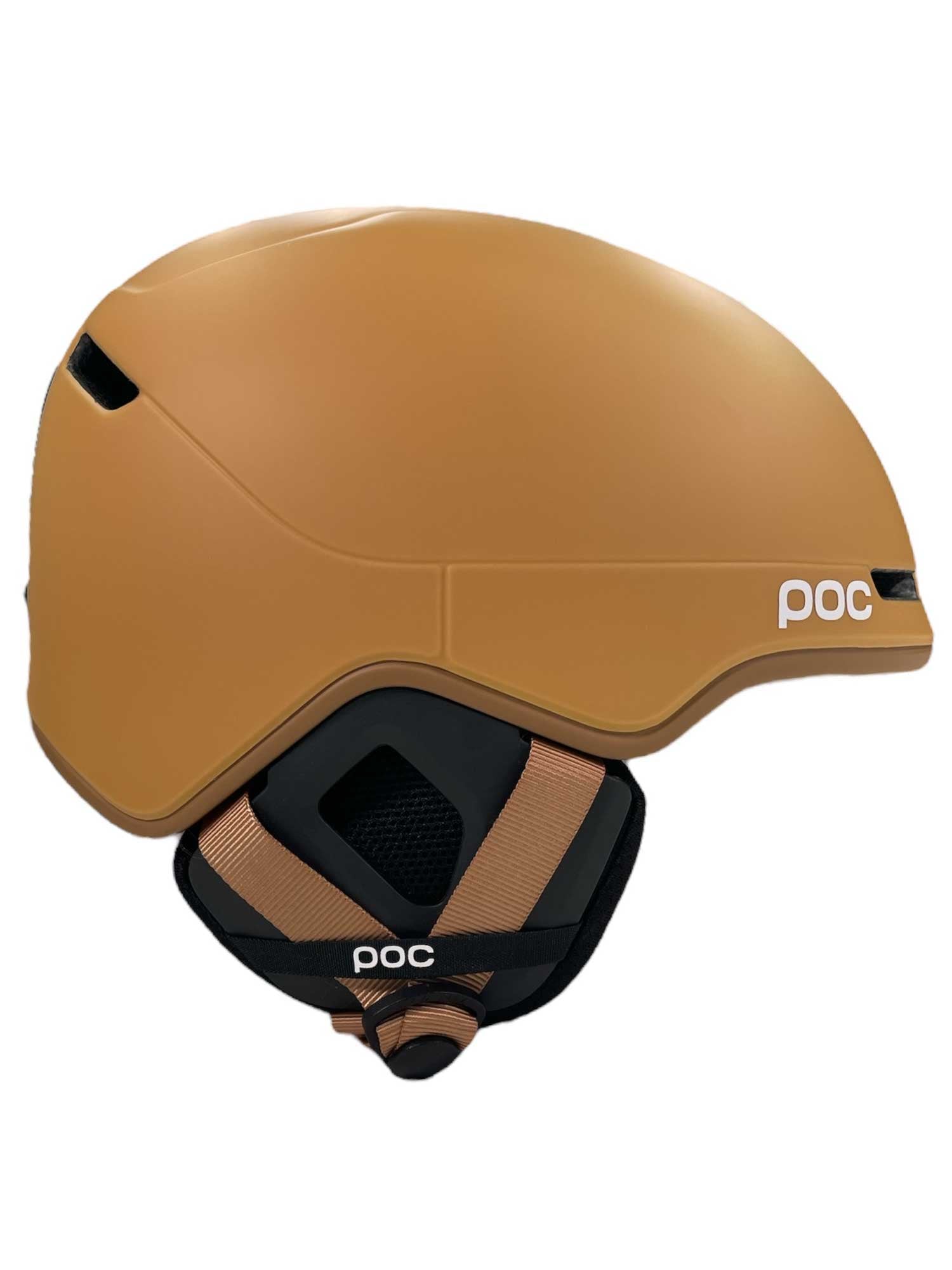 The POC Sports Obex Pure Helmet is a matte brown snowsports helmet with ear protection and black-brown chin straps, shown in side view on a white background.