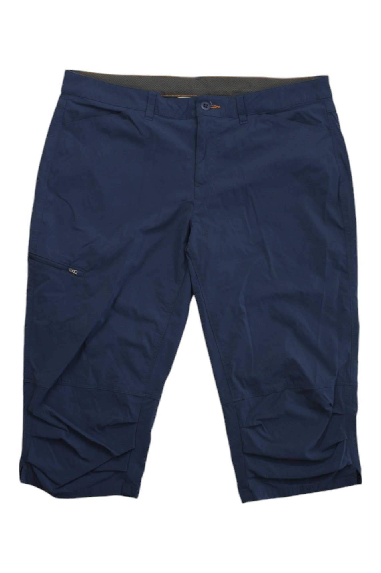 Jackson Quick-Dry Stretch Capri Pants in navy blue, knee-length with button and zipper closure, side and zippered leg pockets. Displayed flat on a white background. Features UPF 50 sun protection—ideal for outdoor adventures.