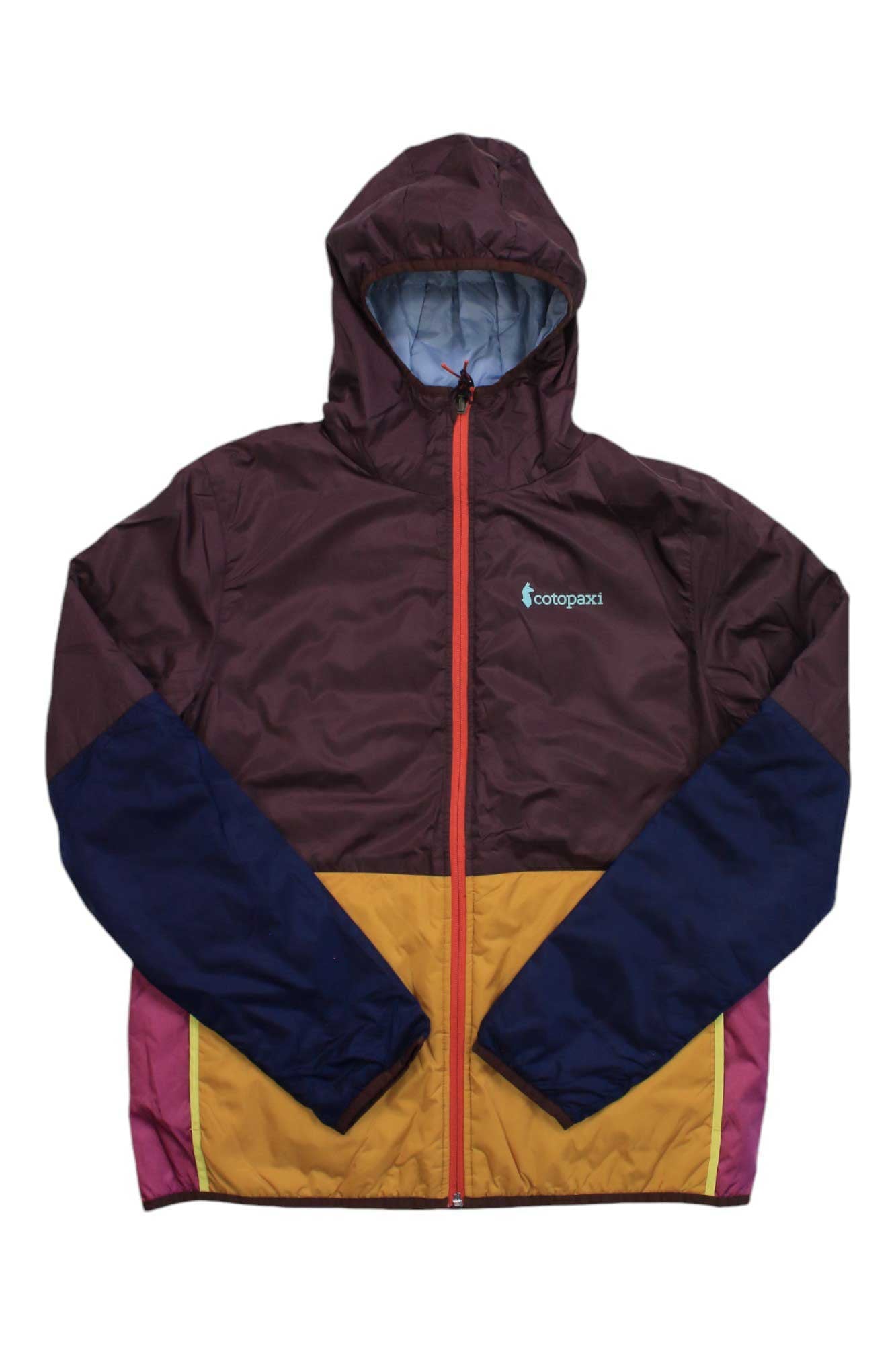 The Cotopaxi Womens Teca Calido Hooded Jacket is a reversible, hooded jacket with a maroon chest and hood, navy sleeves, yellow lower front, pink side panels, orange zipper, and “Cotopaxi” logo on the upper left chest.