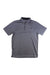 The Under Armour Mens UA Tech Polo is a gray short-sleeve polo with a collar and three buttons, featuring the Under Armour logo on the left chest. Made with moisture-wicking fabric for all-day comfort.