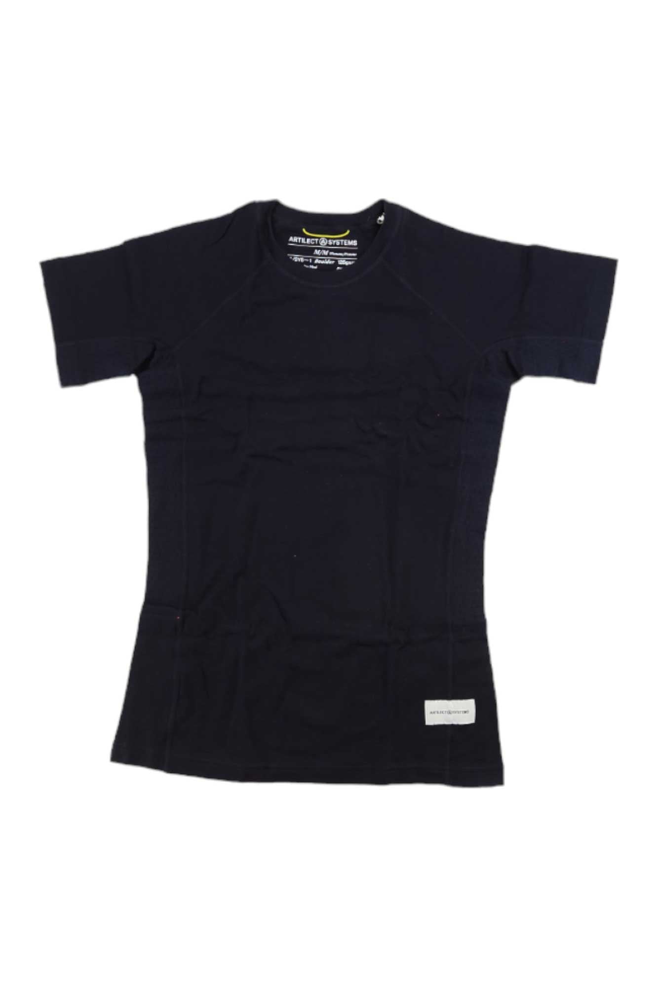 The Artilect Women's Boulder 125 Tee, a black short-sleeve athletic hiking t-shirt, is laid flat on a white background with a small rectangular white label near the bottom hem.