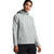 A woman in The North Face Womens Tekno Ridge Pullover Hoodie in light gray with a front pocket and black pants stands facing forward against a plain white background.