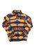 The KAVU Womens Cavanaugh Pullover is a long-sleeve sweater with a high collar, buttoned neckline, and vibrant geometric tribal patterns in yellow, blue, orange, and red—ideal as a cozy travel pullover for women.