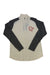 Women’s Pureull zip-neck top in cream with black sleeves, half-zip collar, chest logo