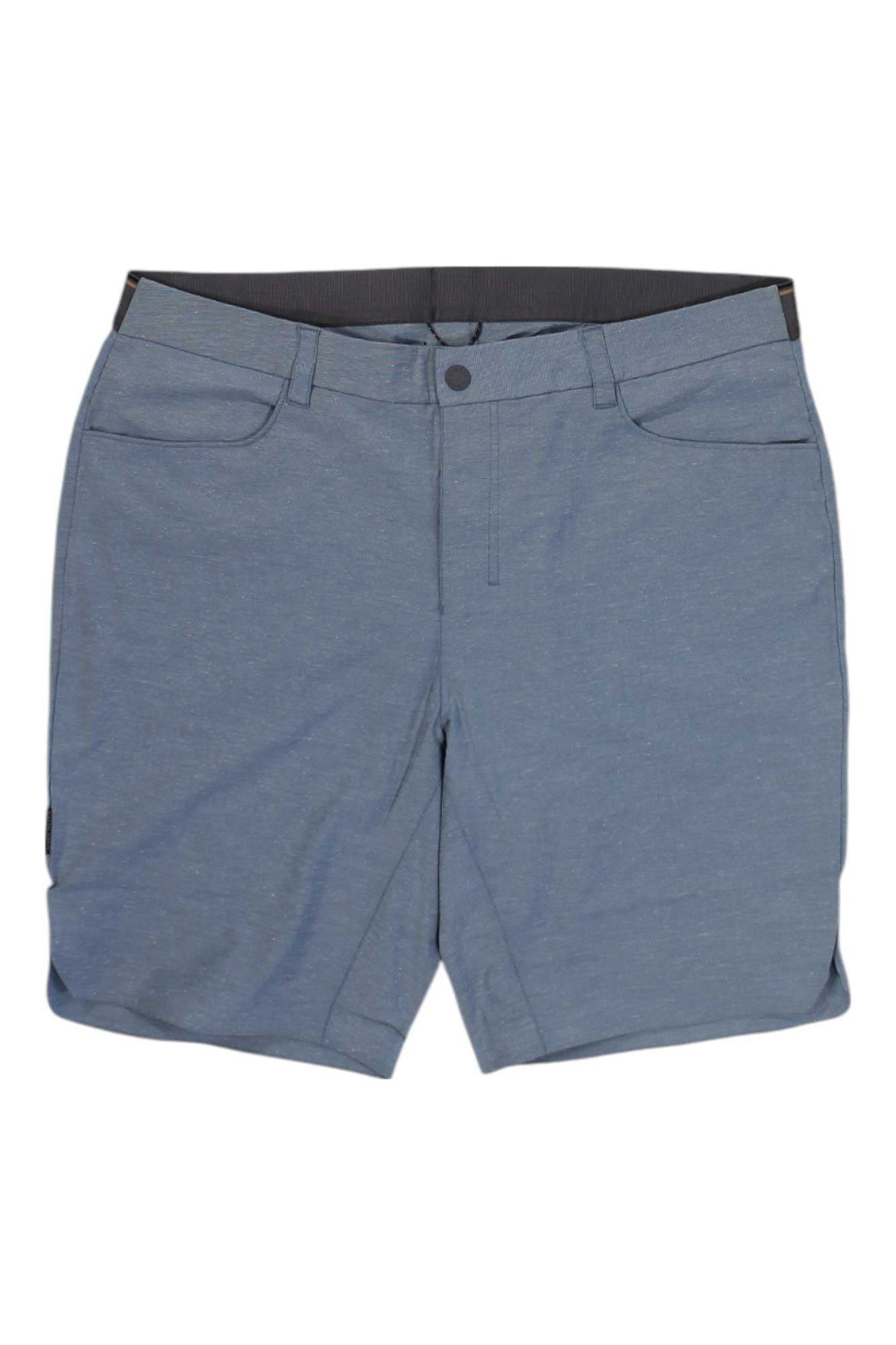 A pair of light blue Club Ride Mens Rider Printed Short featuring front pockets, belt loops, button closure, and a zipper fly, laid flat on a white background. These active stretch shorts provide style and comfort.