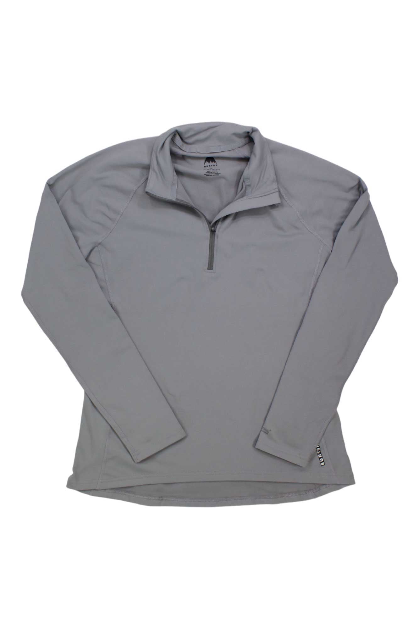 The Burton Womens Heavyweight X Base Layer Quarter-Zip Top in light gray, a long-sleeve, moisture-wicking pullover, is shown laid flat on a white background.