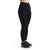 Women's high-rise black tight pants, streamlined fit to ankle, side view