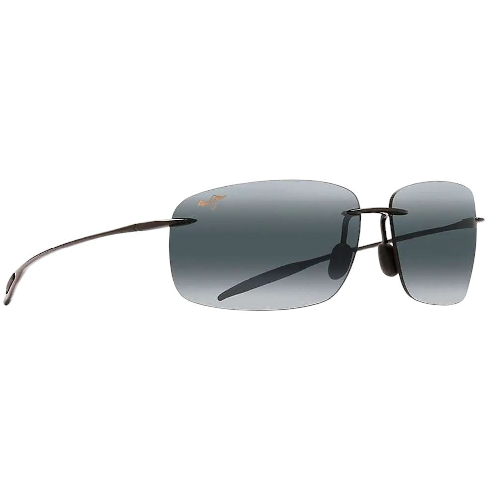 Maui Jim Breakwall Reader Sunglasses: Rimless design with dark rectangular lenses featuring advanced lens tech, thin black arms, and nose pads—perfect for outdoor activities. Displayed on a white background.