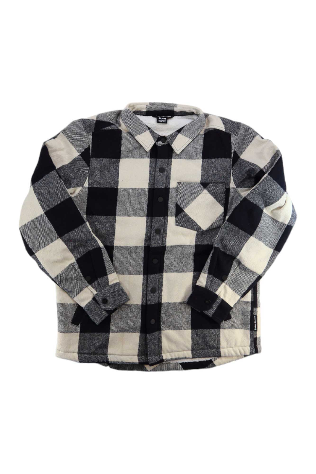 The Black Diamond Mens Project Lined Flannel Shirt, featuring black and white checks, organic cotton fabric, a button-up front, collar, and single chest pocket, is shown laid flat on a white background.