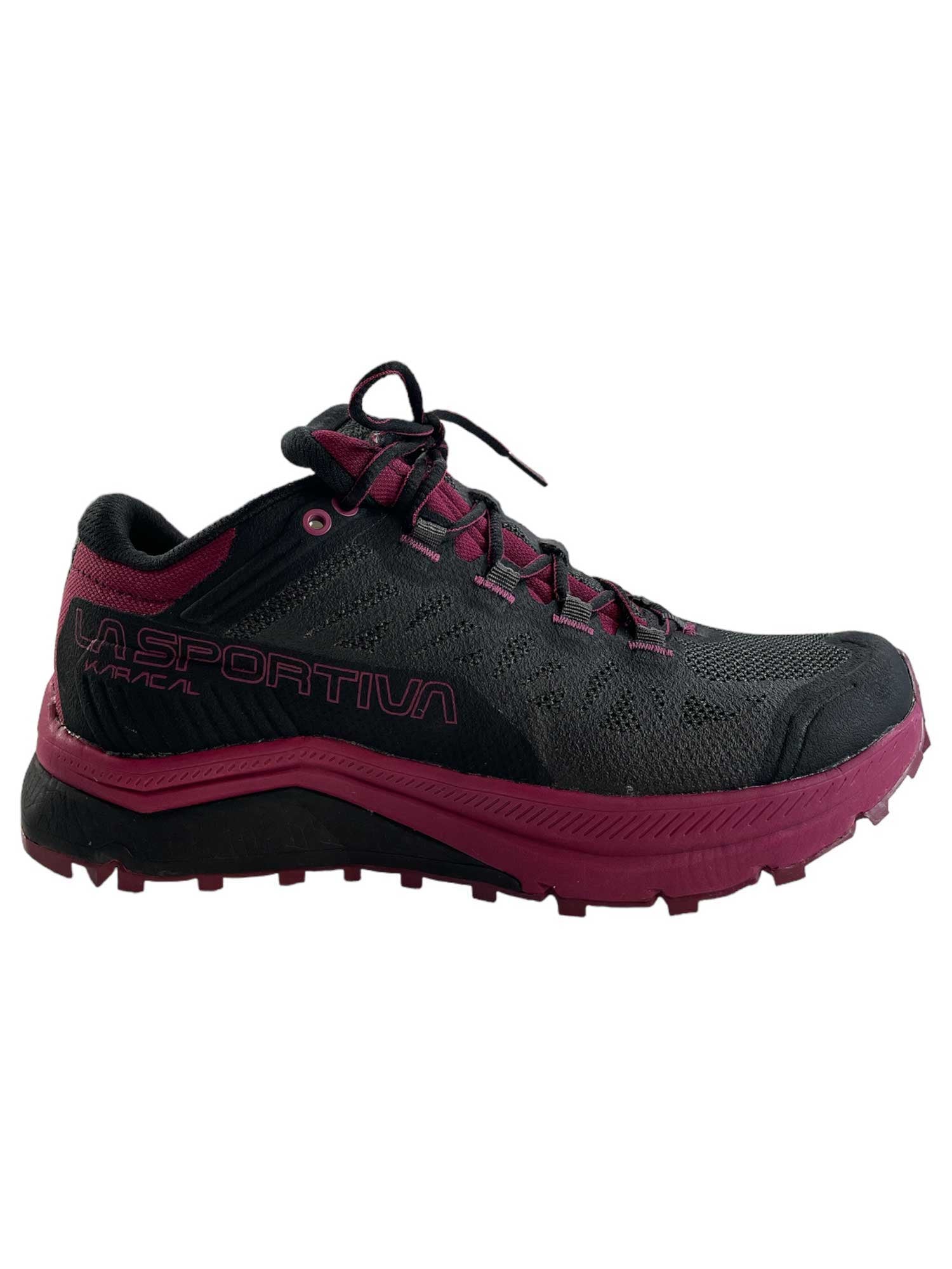 Trail-running shoe in dark gray/black with plum accents and knobby tread outsole