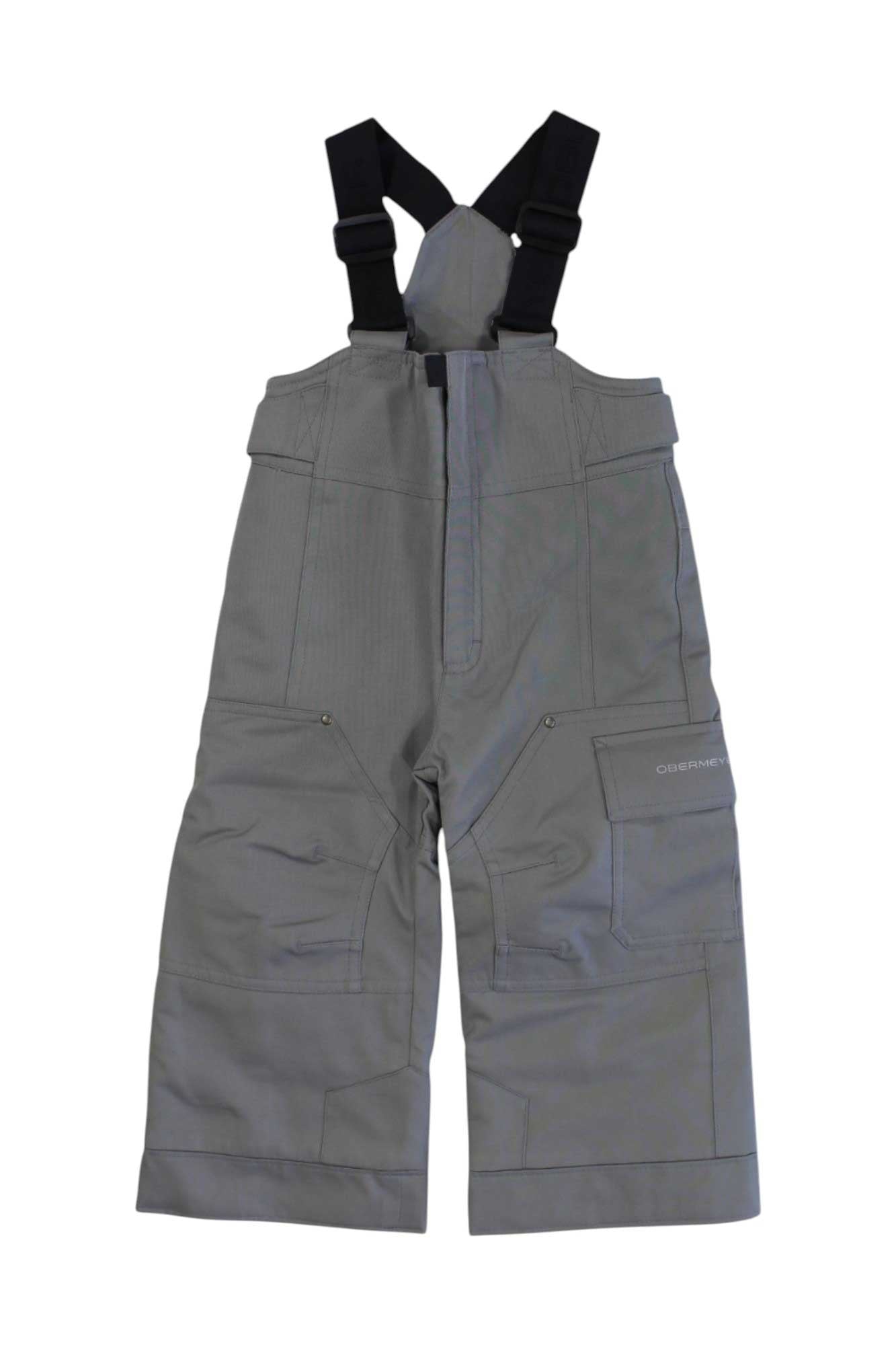 The Obermeyer Boys Volt Pant, shown flat on a white background, features adjustable suspenders, multiple pockets, and reinforced knees for comfort and durability—making it an ideal choice for boys' ski pants.