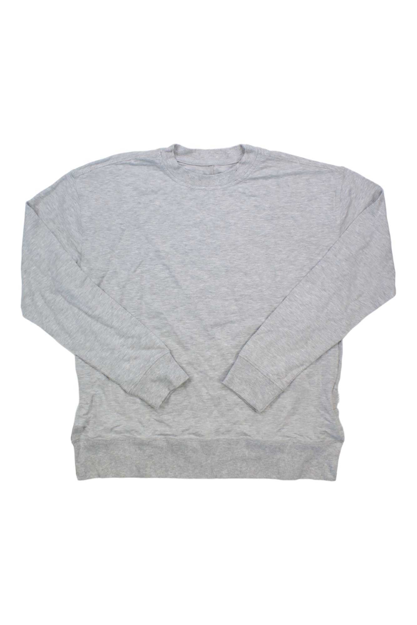 The Boody Womens Weekend Crew Pullover in light gray is displayed flat on a white background. This bamboo pullover has long sleeves, ribbed cuffs, neckline, and hem, featuring a simple design for comfort and effortless style.