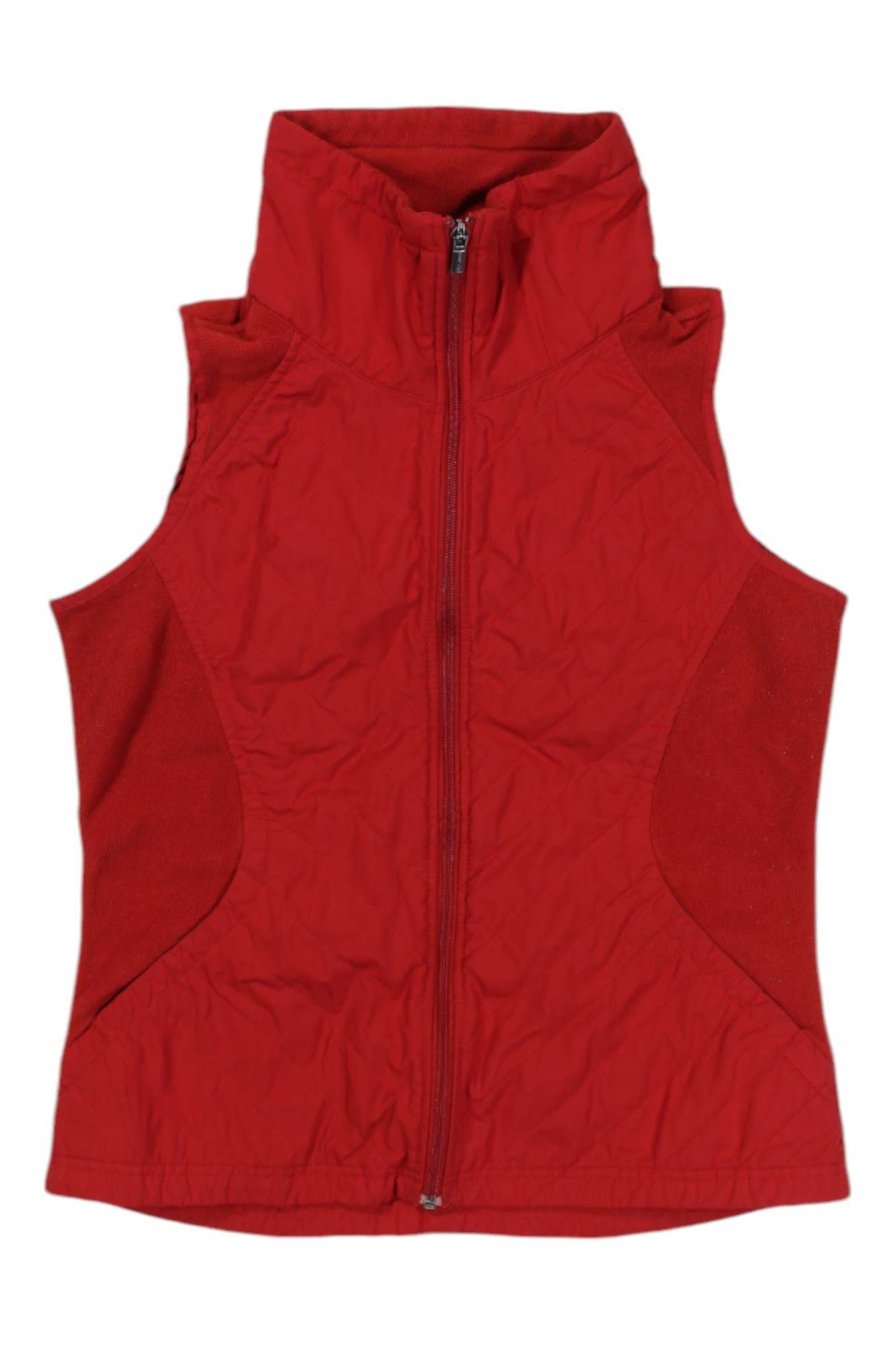 The Columbia Womens Perfect Mix Vest, shown sleeveless in red with a high collar and slightly textured fabric on a white background, is a stylish and lightweight outdoor vest perfect for women.