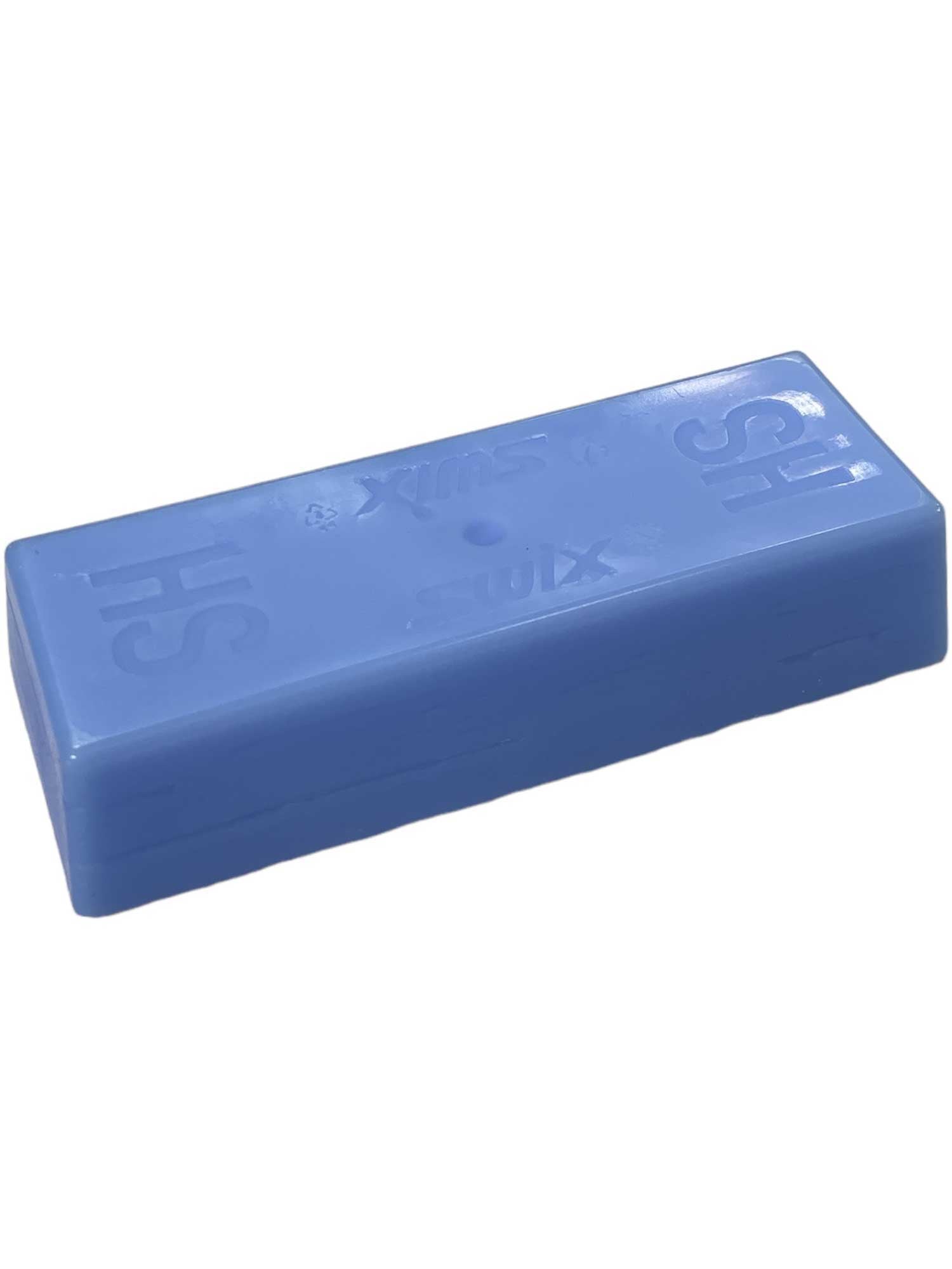 A rectangular blue block of Swix High Speed 6 Wax, designed for cold conditions with slightly rounded edges and indented markings, is displayed on a plain white background.