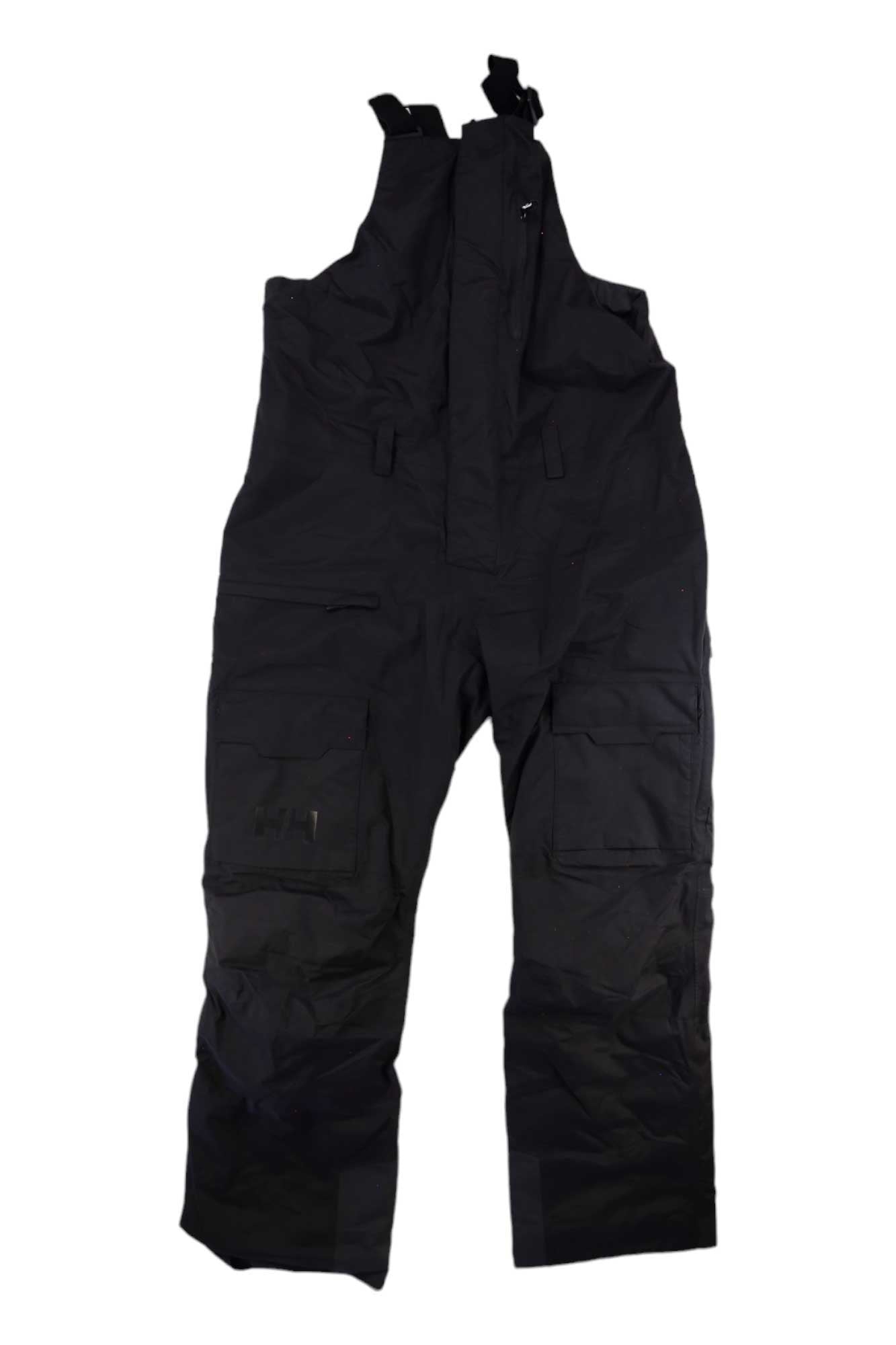 Helly Hansen Mens Sogn Bib Cargo Pant in black, featuring adjustable shoulder straps, a chest pocket, multiple cargo pockets, and reinforced knees, laid flat on a white background.