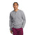 A person wears The North Face Mens Canyon Fog Thermal LS Henley—a light gray, patterned long-sleeve shirt—with maroon pants, standing casually with one hand in their pocket against a plain white background.