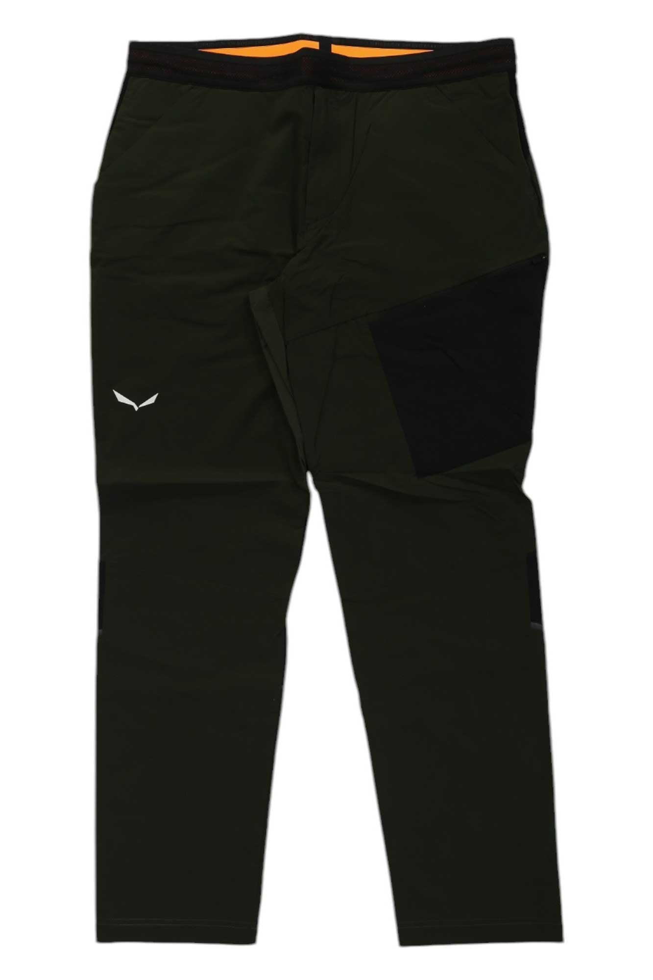 The Salewa Mens Pedroc 2 DST Light Pant features a dark green quick-drying design, black detailing on one thigh, an elastic waistband, and a small white logo on the upper left leg.