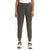 A person wears The North Face Womens Aphrodite Jogger in olive green, quick-dry fitness pants, with a white shirt and white sneakers featuring beige soles, standing against a plain white background. Image is cropped at the shoulders.