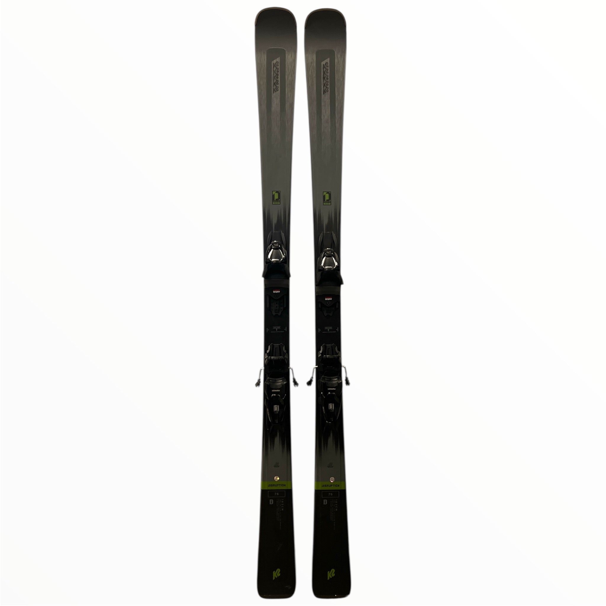 The K2 Disruption 76 Ski + ERP 10 Bindings, featuring a modern black and gray design, stands upright side by side against a plain white background.
