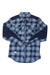 The Norrona Mens Svalbard Flannel Shirt features a blue and navy plaid body with chest pockets, solid navy sleeves and shoulders, and is shown laid flat on a white background.