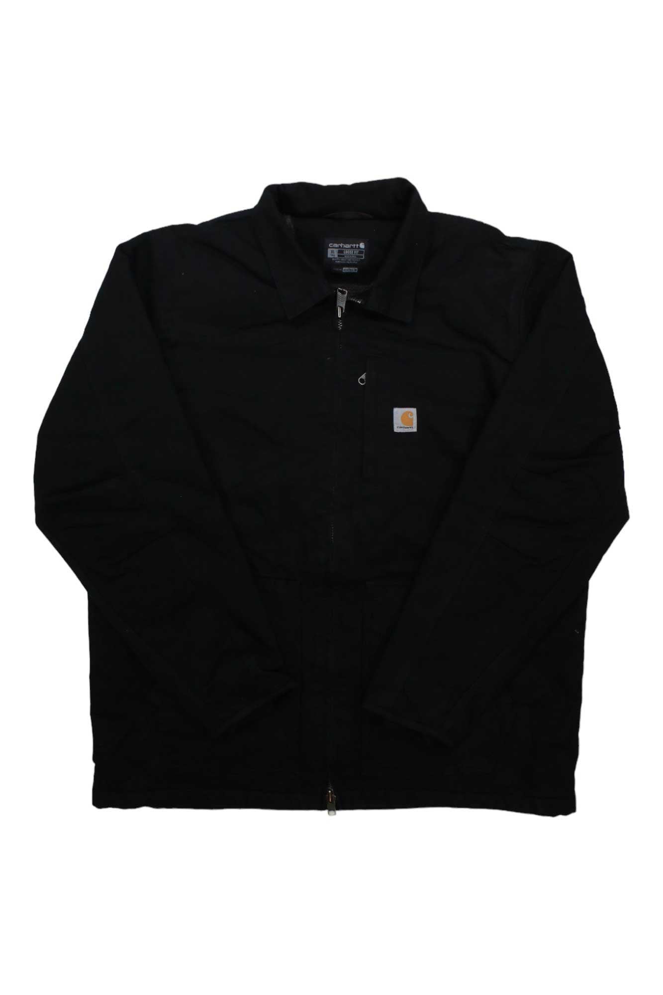 The Carhartt Mens Sherpa Lined Coat in black features a zip-up front, collar, and a small square Carhartt logo patch on the left chest. This washed duck coat is displayed flat on a white background.