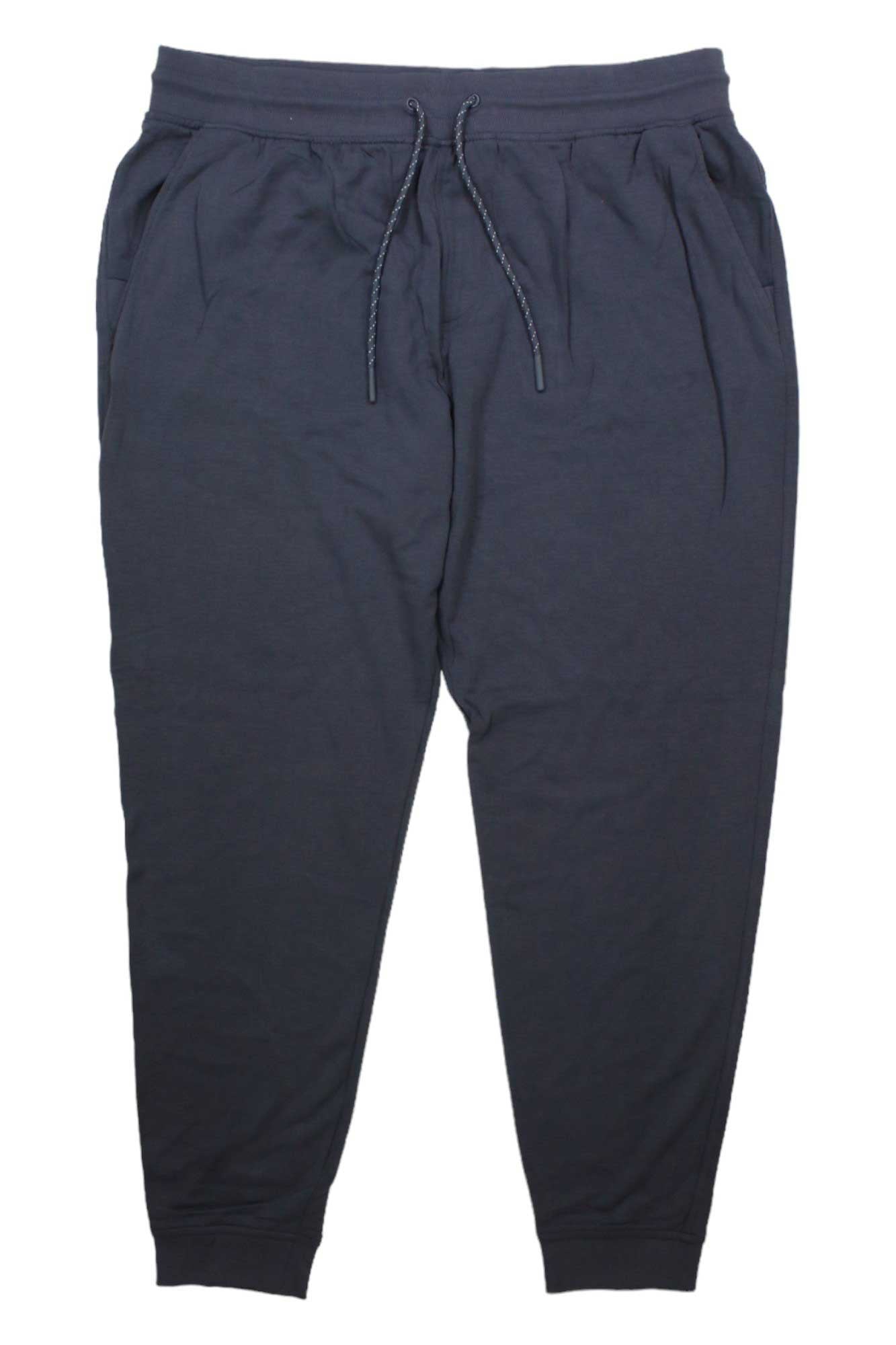 The Free Fly Mens Bamboo Lightweight Fleece Jogger in plain black features an elastic waistband with drawstring, side pockets, and cuffed ankles, shown laid flat on a white background.